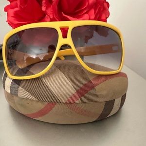 Yellow Burberry sunglasses.